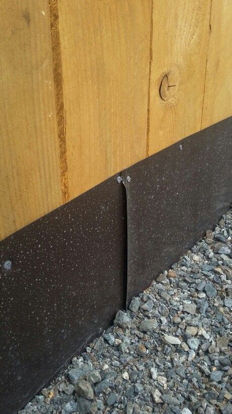 sheet metal along bottom of fence|bottom of animal fence posts.